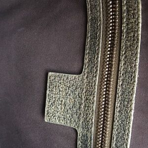 Gucci gold purse gently used